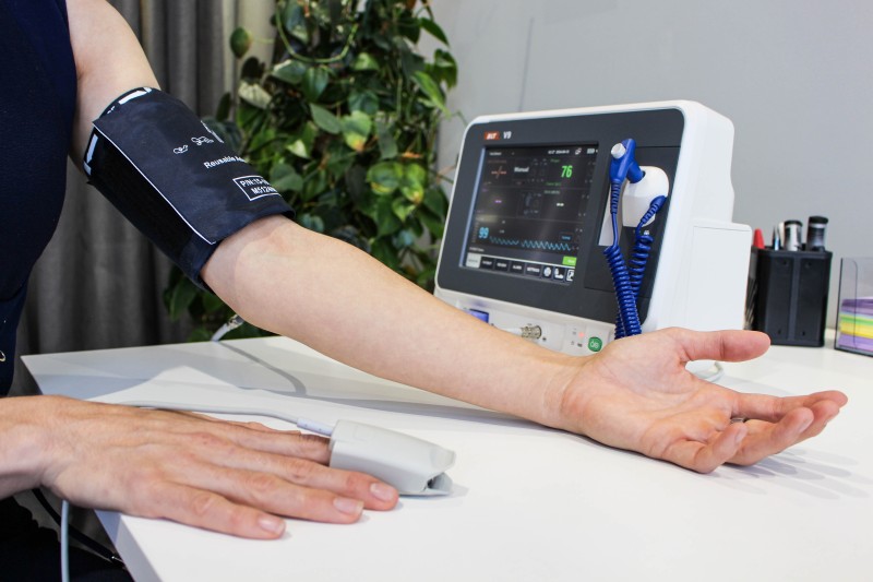 Person getting their blood pressure checked